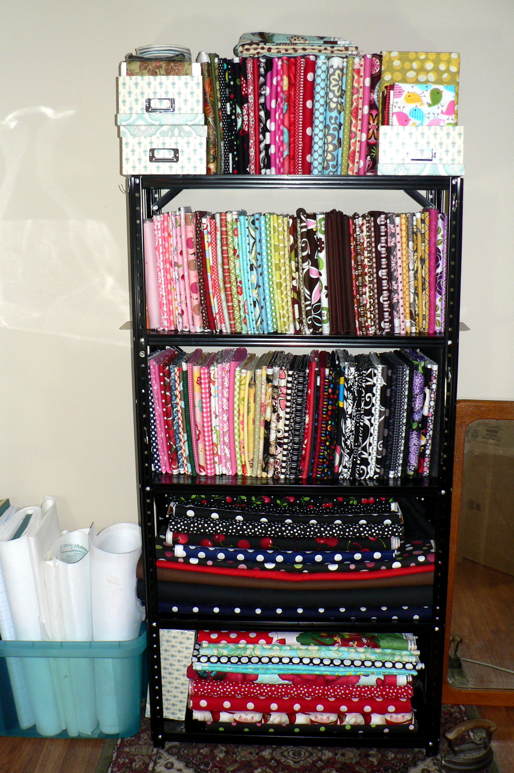 Shelves full of coordinating quilting fabrics, circa 2014