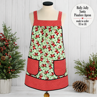 Holly Jolly Santa (on mint green) Pinafore with no ties, relaxed fit smock with pockets, Multi-Cultural Santas, made to order XS to 5X