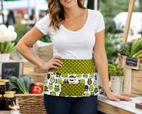 Metro Market Apples waist apron with zipper pocket – handmade utility apron for educators, vendors & craft shows. Fits waists up to 40 inches.