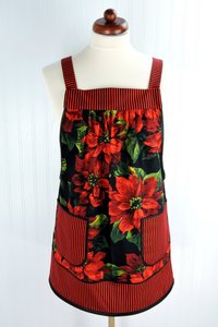 XS-5X Scarlet Poinsettia Pinafore with no ties, relaxed fit smock with pockets, large red poinsettias on black