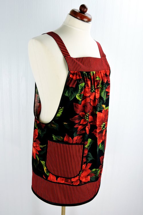 XS-5X Scarlet Poinsettia Pinafore with no ties, relaxed fit smock with pockets, large red poinsettias on black